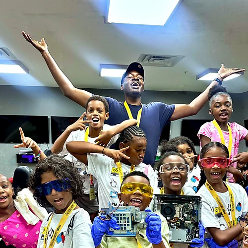 Students cheering in safety goggles